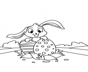 Printable cute bunny with two easter eggs coloring pages